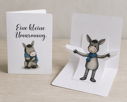 Pop-up-Karte „Eine kleine Umarmung“ – Esel Brösel (DIN A6)